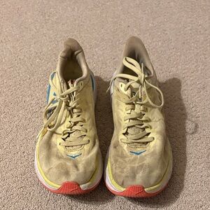 Hoka Light green with coral and teal accents running Shoes